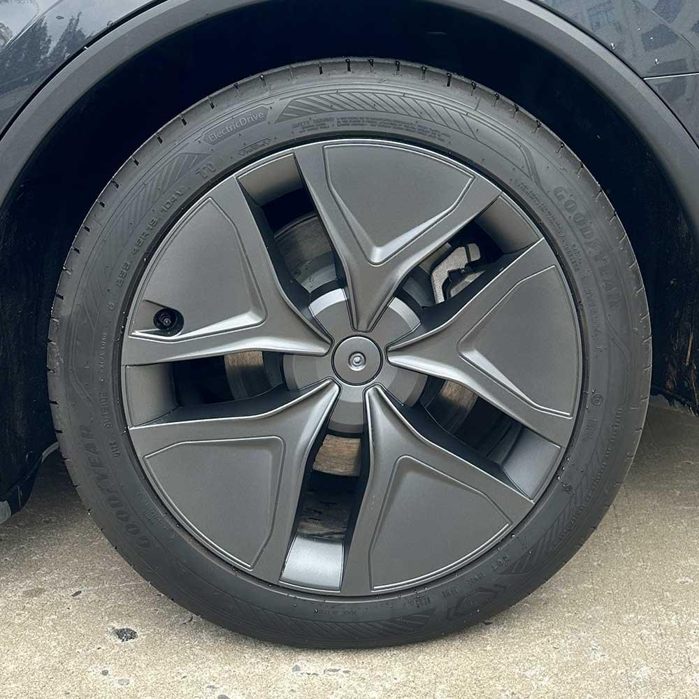19-inch Arachnid style aero wheel cover installed on the front wheel