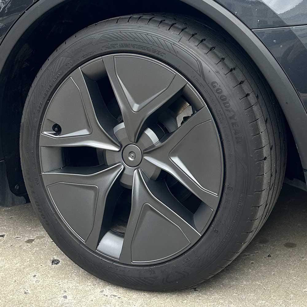 19-inch Arachnid style aero wheel covers installed on Model Y