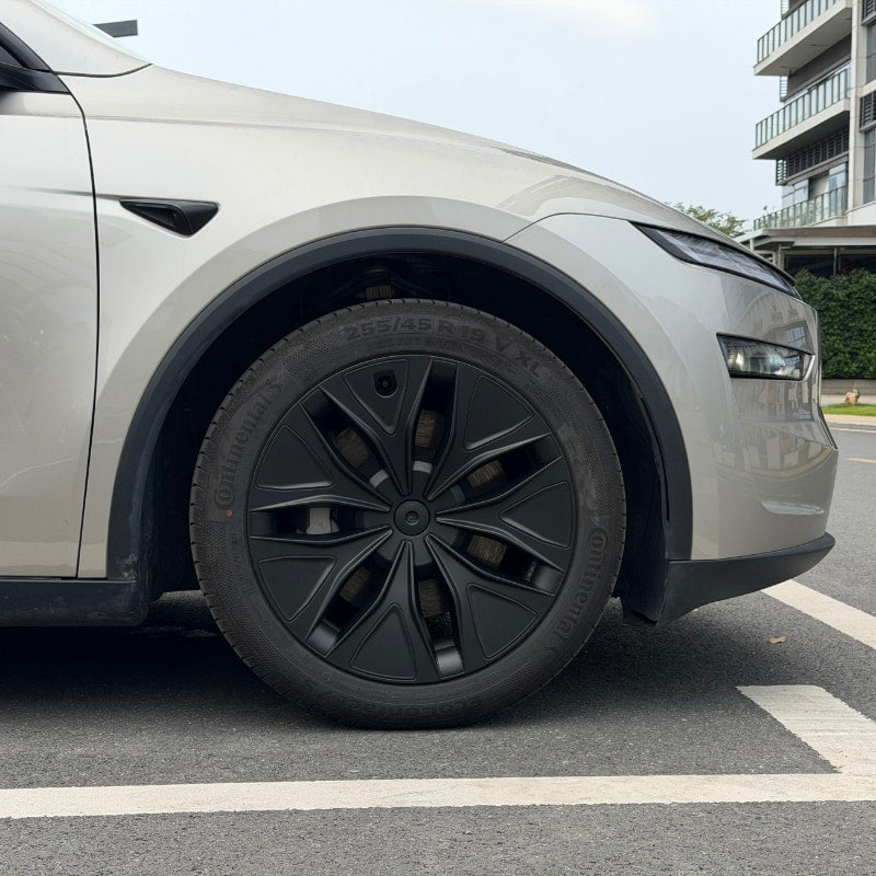 19-inch matt black aero wheel covers installed on the Model Y L