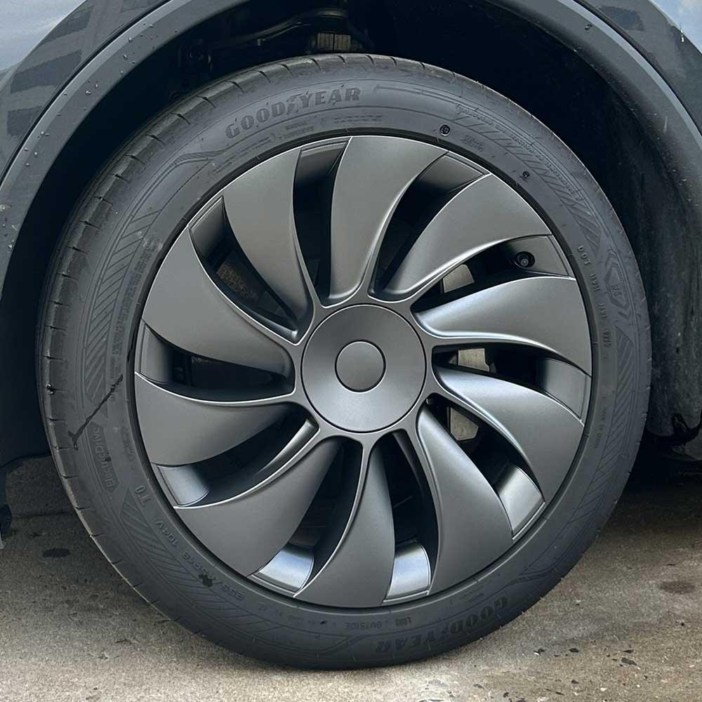 19-inch TurboFlow wheel cover installed on the front wheel