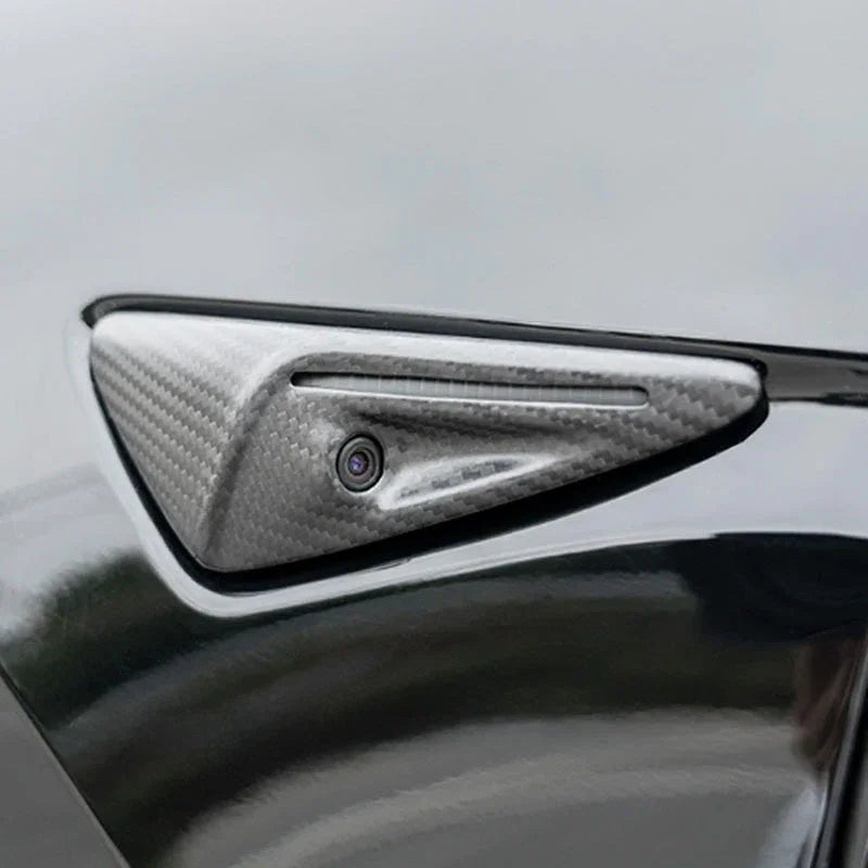 Close-up showing camera opening and seamless carbon fiber integration.