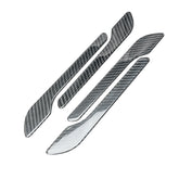 Real carbon fibre door handle wrap covers for Tesla Model 3 (2024–2025) and Model Y (2025 Juniper), shown in a four-piece set on a white background.