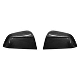 Genuine carbon fibre rear view mirror covers for the 2025 Tesla Model Y Juniper, shown as a high-gloss pair on a white background.