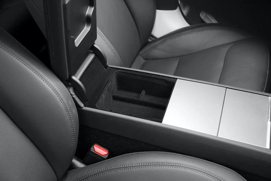 Armrest organiser tray installed inside the centre console of Model 3 and Model Y