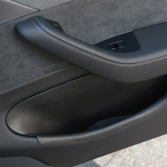 Custom-fit door storage tray seamlessly integrated into the front door pocket of Model Y L