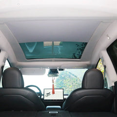 Interior view of Model Y with the electric sunshade sunroof installed