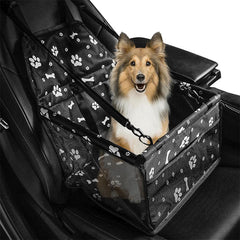 Pet sitting securely in the foldable pet car seat and travel bed
