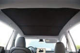 Glass roof sunshade installed in Model Y (2025–2026)