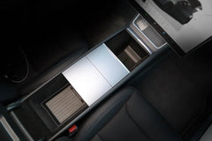 Lower armrest organiser liner allowing easy access to the USB-C ports in Model Y