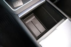 Lower centre console organiser liner installed in the Model Y centre console
