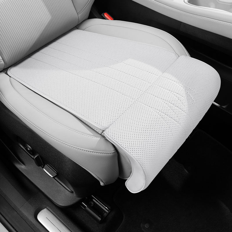 Front seat leg support cushion fitted to the vehicle seat