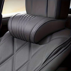 Adjustable elastic strap securing the neck support pillow to the seat
