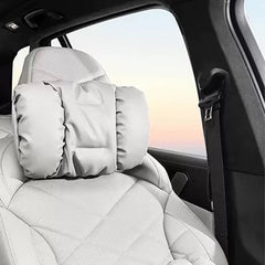 Nappa leather neck support pillow installed on the headrest