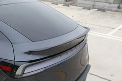 Performance spoiler installed on the rear tailgate of Model Y (2025–2026)