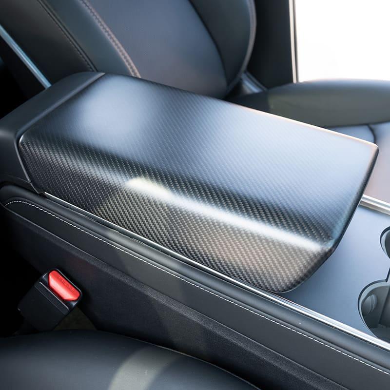 Close-up of the installed armrest cover on the centre console