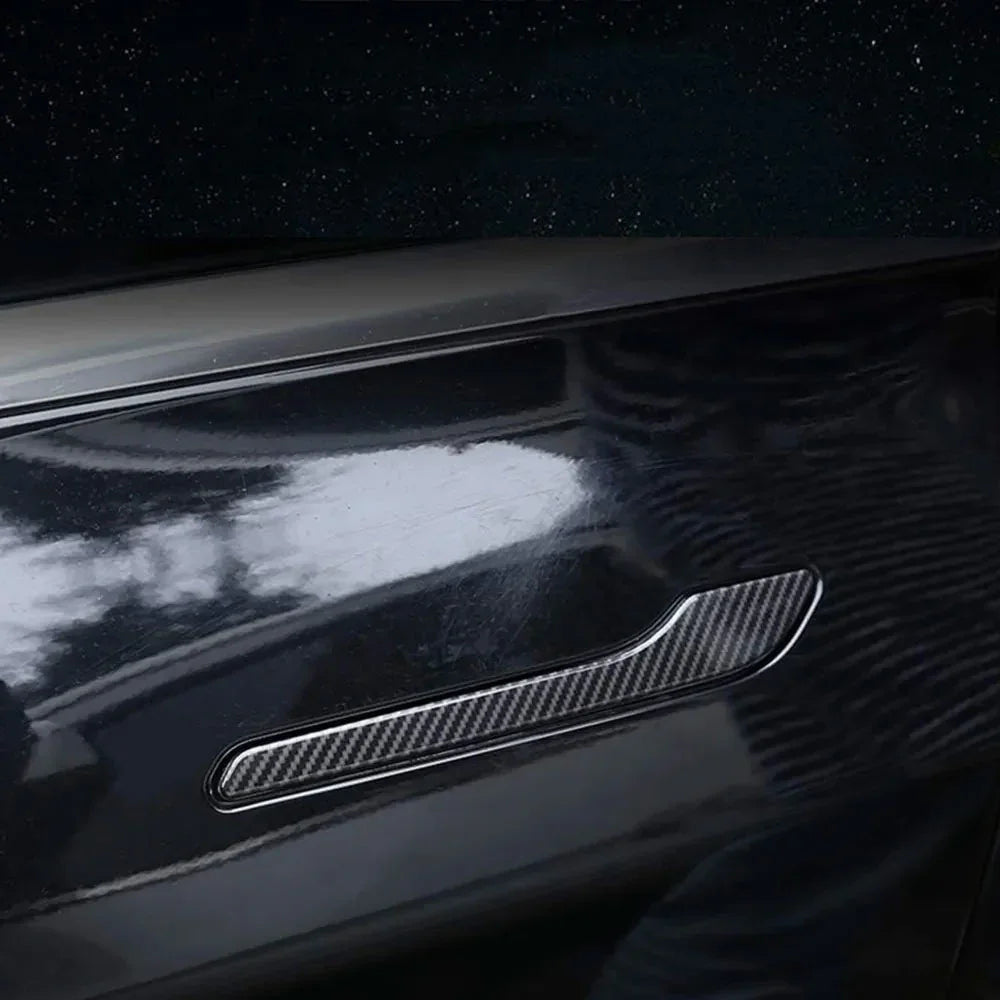 Real carbon fibre door handle wrap cover installed on a Tesla door handle