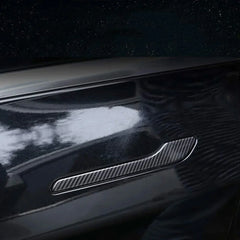 Real carbon fibre door handle wrap cover installed on a Tesla door handle