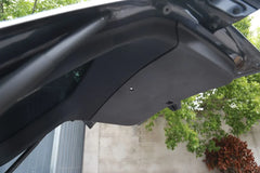 Close-up of the edge of the rear trunk tailgate protective liner