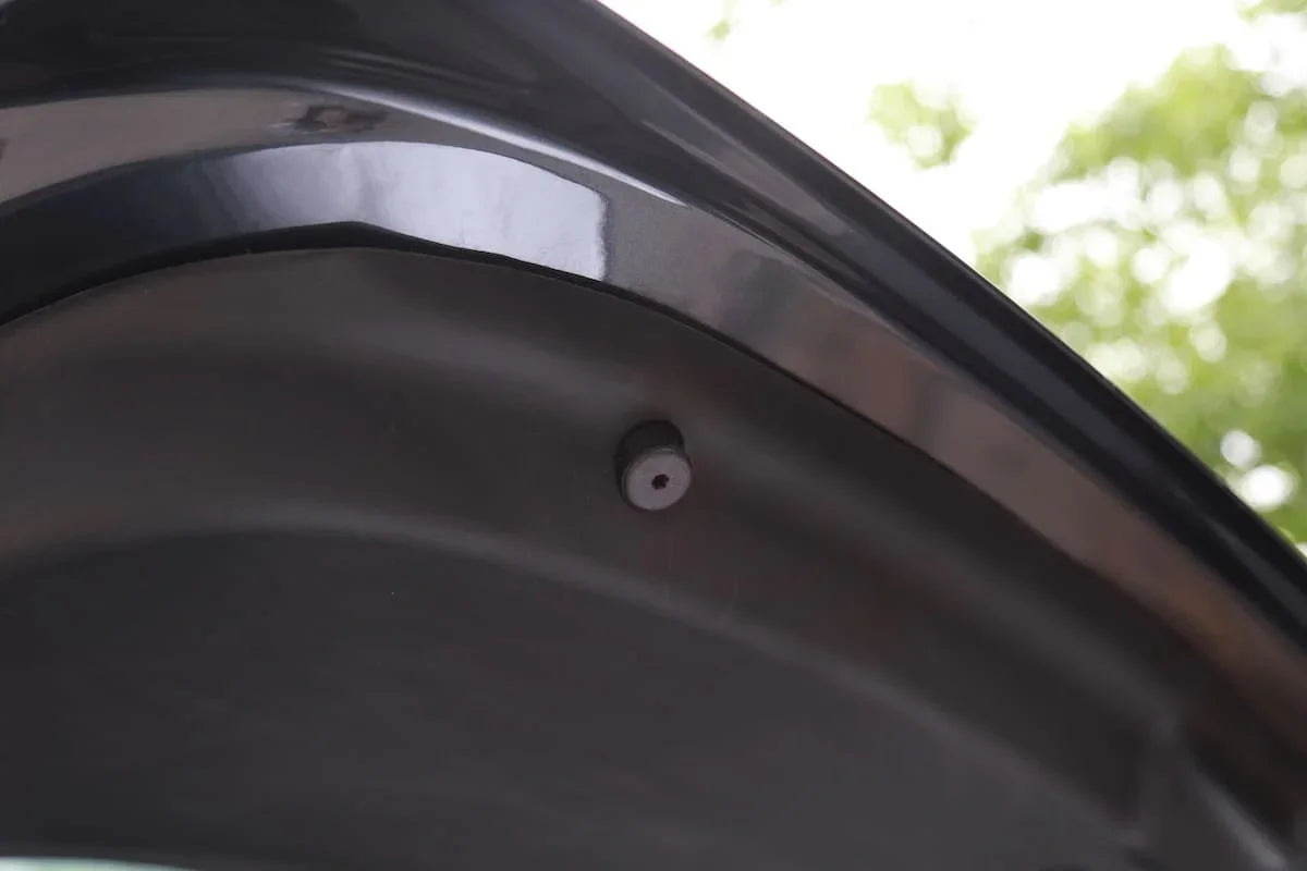Close-up showing the precision fit of the rear trunk tailgate protective liner