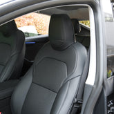 Black microfibre leather front seat cover installed on Model Y (2025–2026)