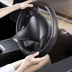 Steering wheel grip grab cover installed on Model Y and Model 3