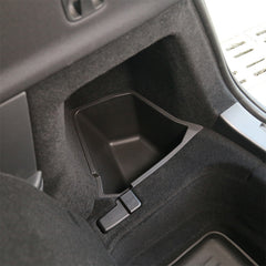 Right side trunk storage box fitted into the cargo side compartment of Model Y L