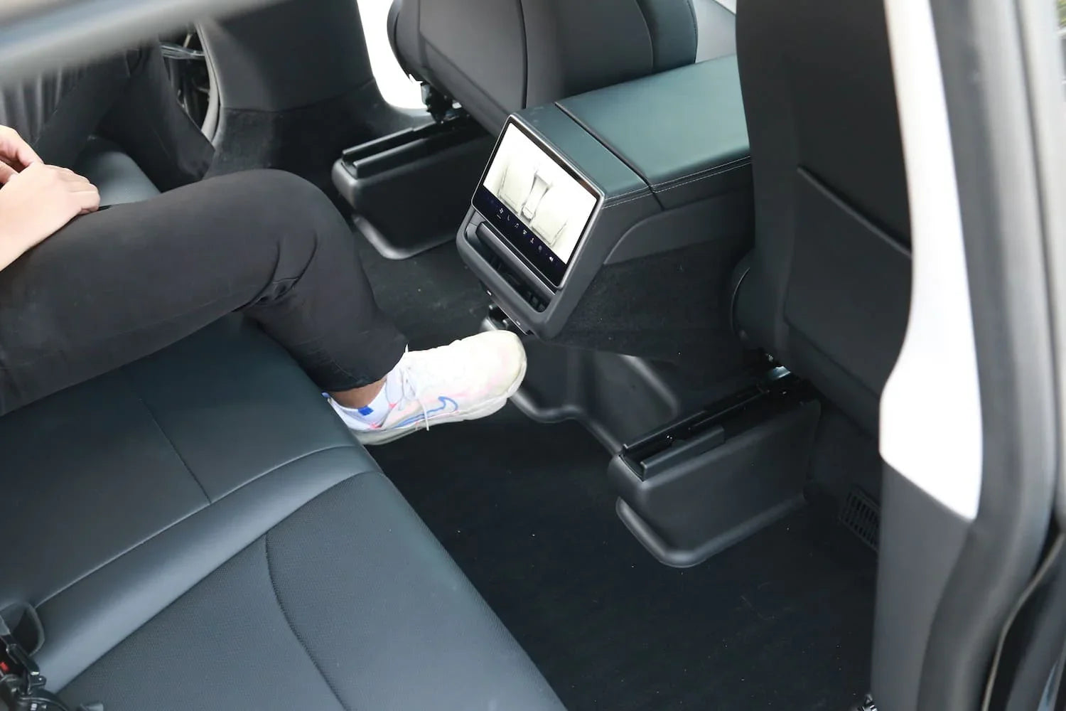 Fitting the under seat carpet protector in Model Y