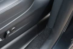 Close-up of the installed under seat carpet protector