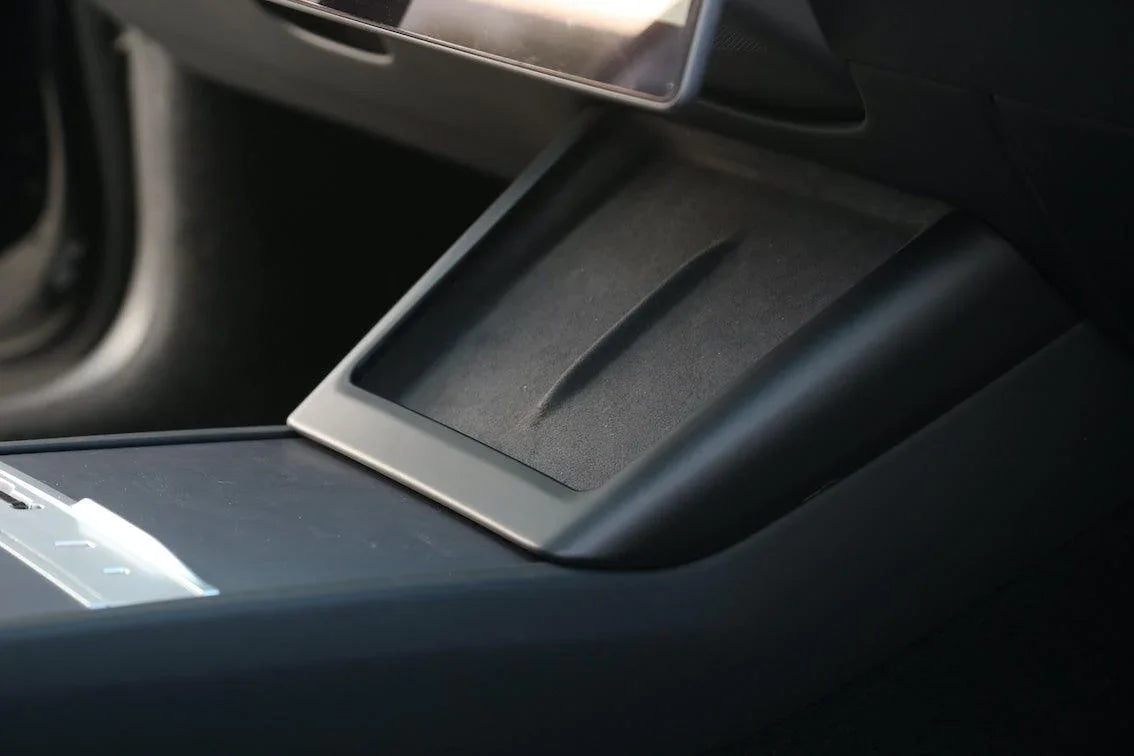 Matt black wireless phone charger surround installed around the wireless charging pad