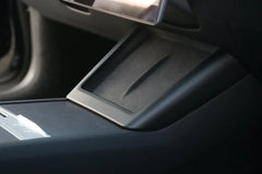 Matt black wireless phone charger surround installed around the wireless charging pad