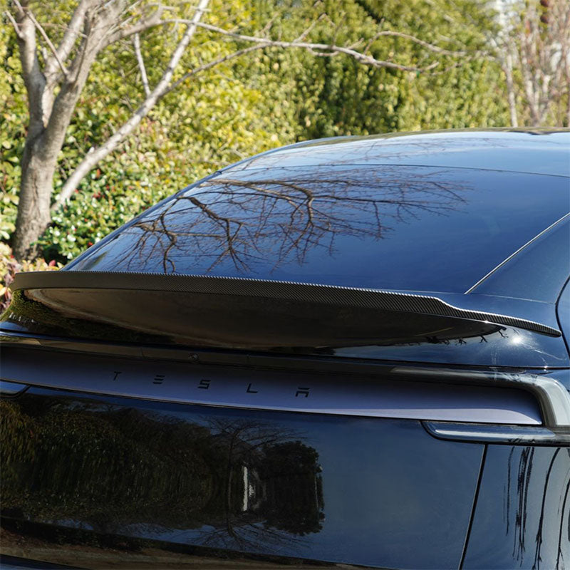Close-up detail of YL Style Performance rear spoiler on Model Y