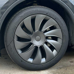 19-inch TurboFlow wheel cover installed on the front wheel