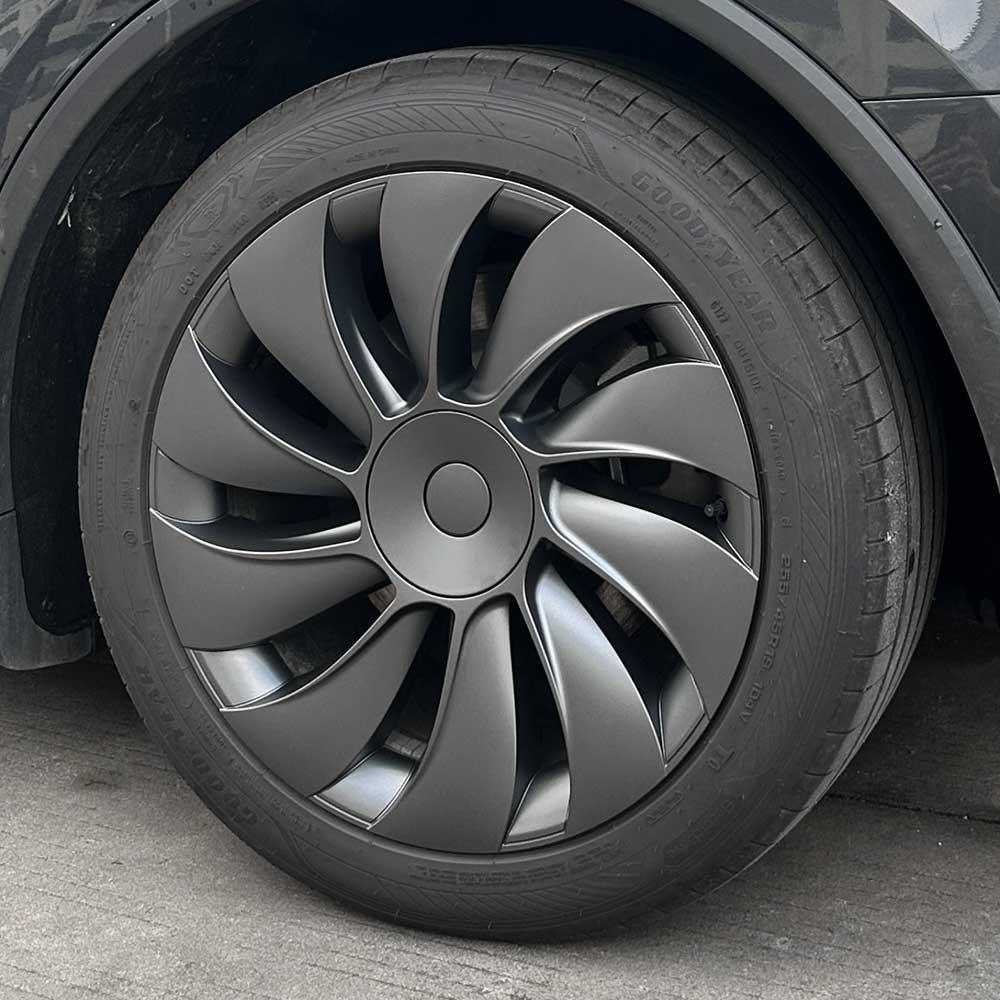 19-inch TurboFlow wheel covers installed on Model Y