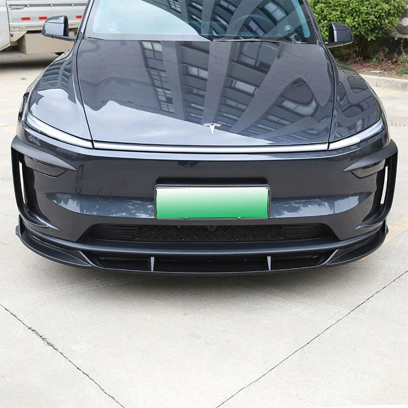 Front view of the wind deflector headlight trim installed on Model Y