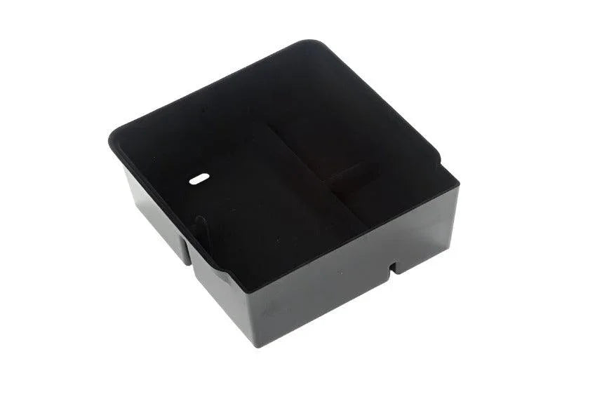 Close-up of the ABS armrest organiser tray for Model 3 and Model Y