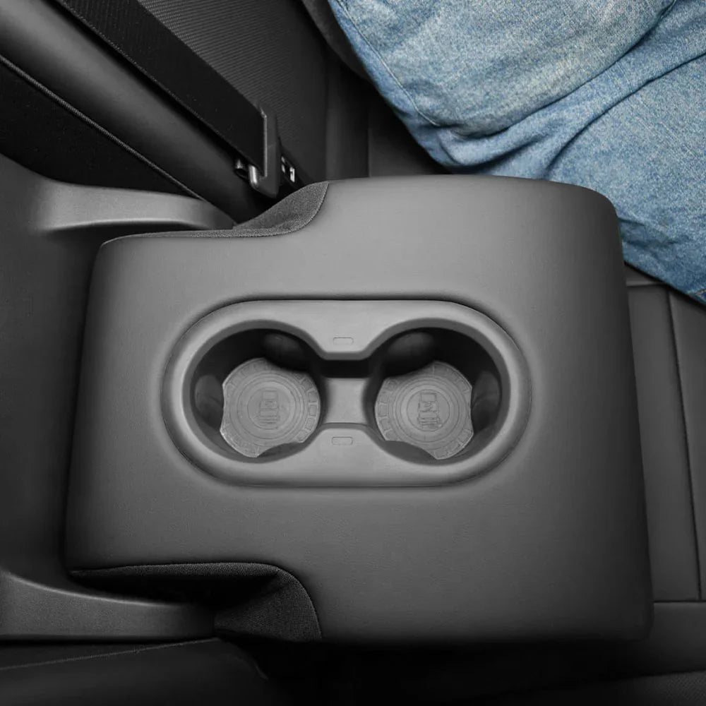 Silicone rear cup holder insert providing convenient storage for rear passengers