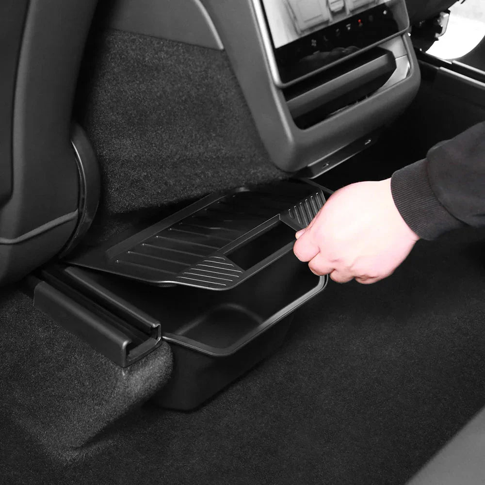 Removing the backseat storage bin for quick emptying and easy cleaning