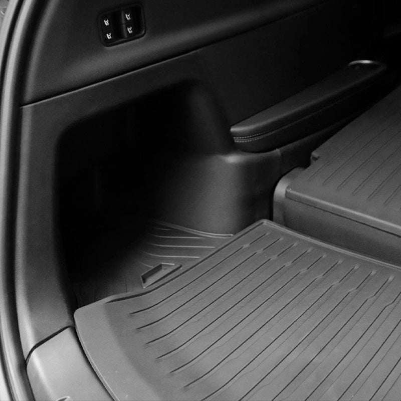 Left boot sidewall protector installed in the rear cargo area of Model Y L