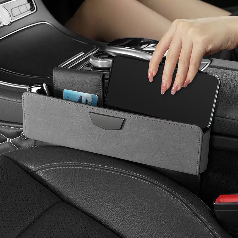 Car seat gap filler storing small everyday essentials