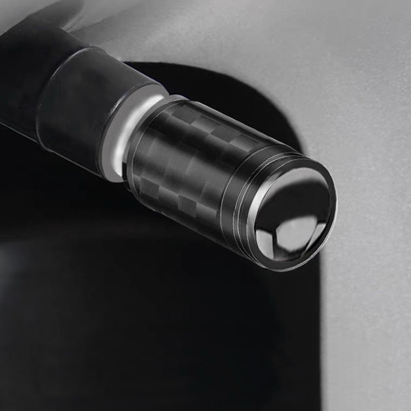 Carbon fibre tyre valve stem cap installed on a tyre valve