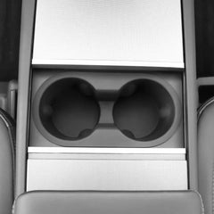 Cup holder insert installed in the center console of Model 3 and Model Y