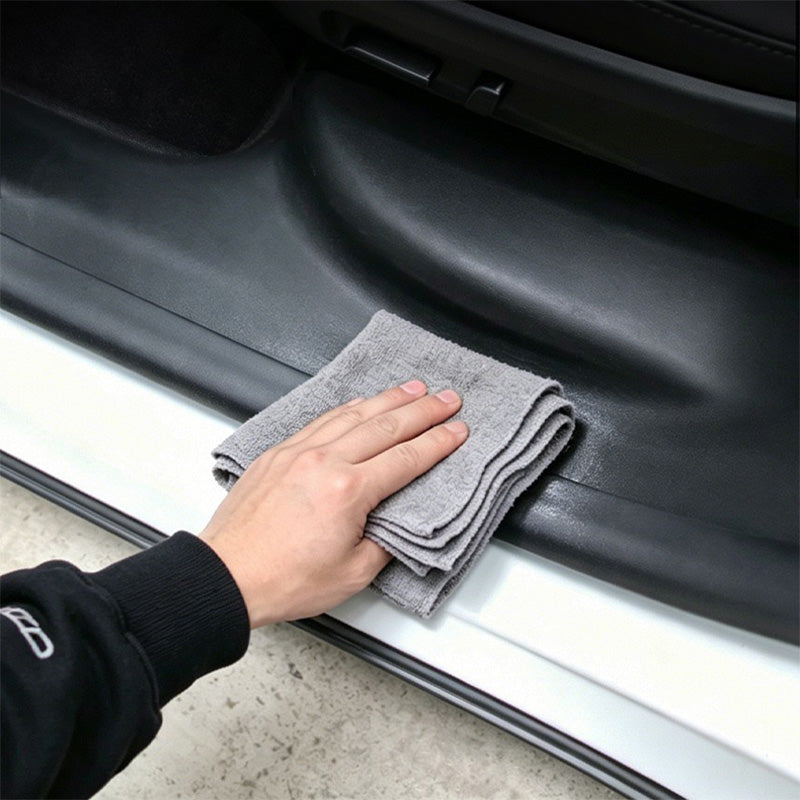 Close-up of the door sill protector surface for Model Y L (2026)
