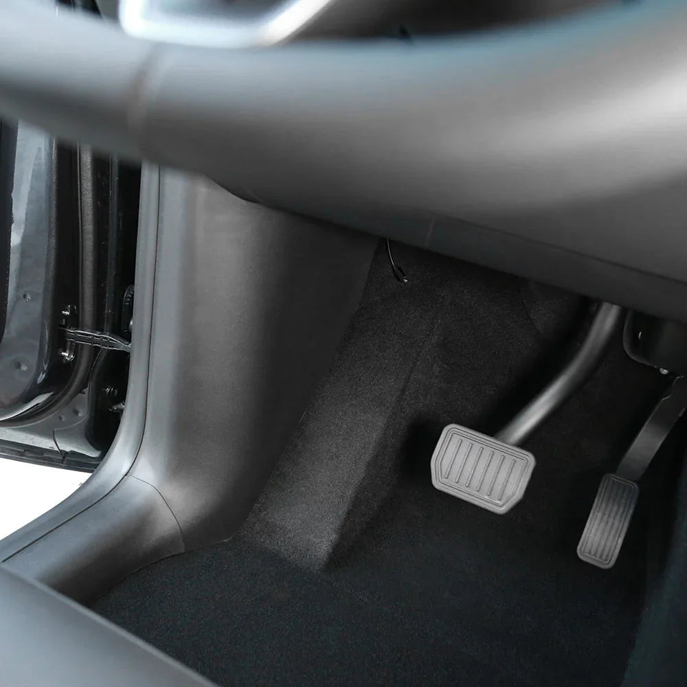 Front side carpet protector installed beneath the seat