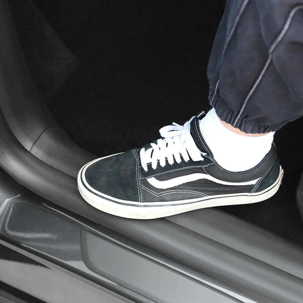 Door sill protector helping protect the door sill from shoe scuffs