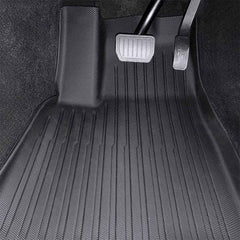 Close-up view of driver side floor mat for Tesla Model Y L (2026)