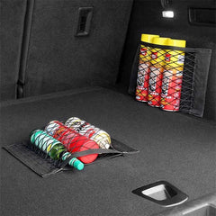 Elastic trunk mesh storage net installed in the cargo area