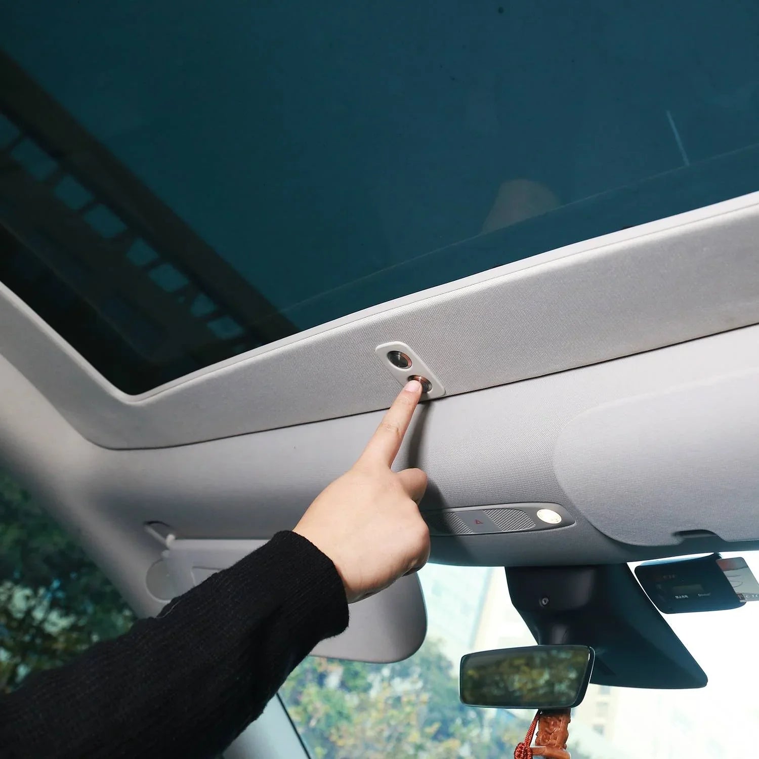 Electric sunshade sunroof opened inside Model Y