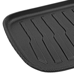 Front boot mat with raised edges for enhanced spill protection in Model Y