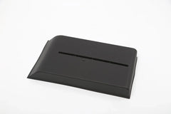 Close-up of the durable TPE lower centre console organiser liner for Model Y