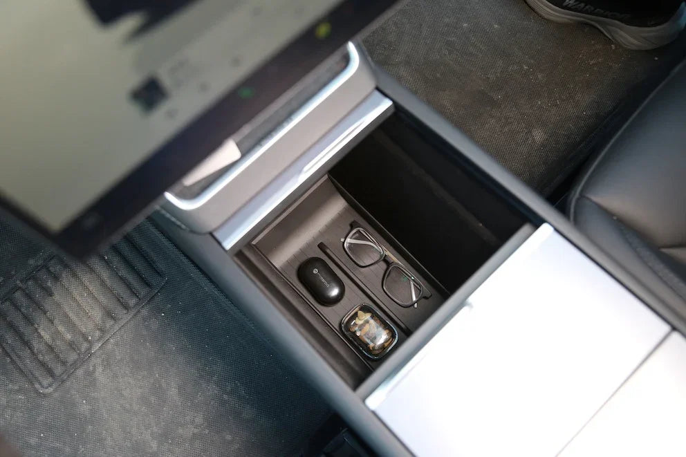 Lower centre console organiser liner allowing easy access to the USB-C ports in Model Y